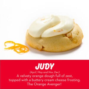A velvety orange dough full of zest, topped with a buttery cream cheese frosting by RubySnap Bakery