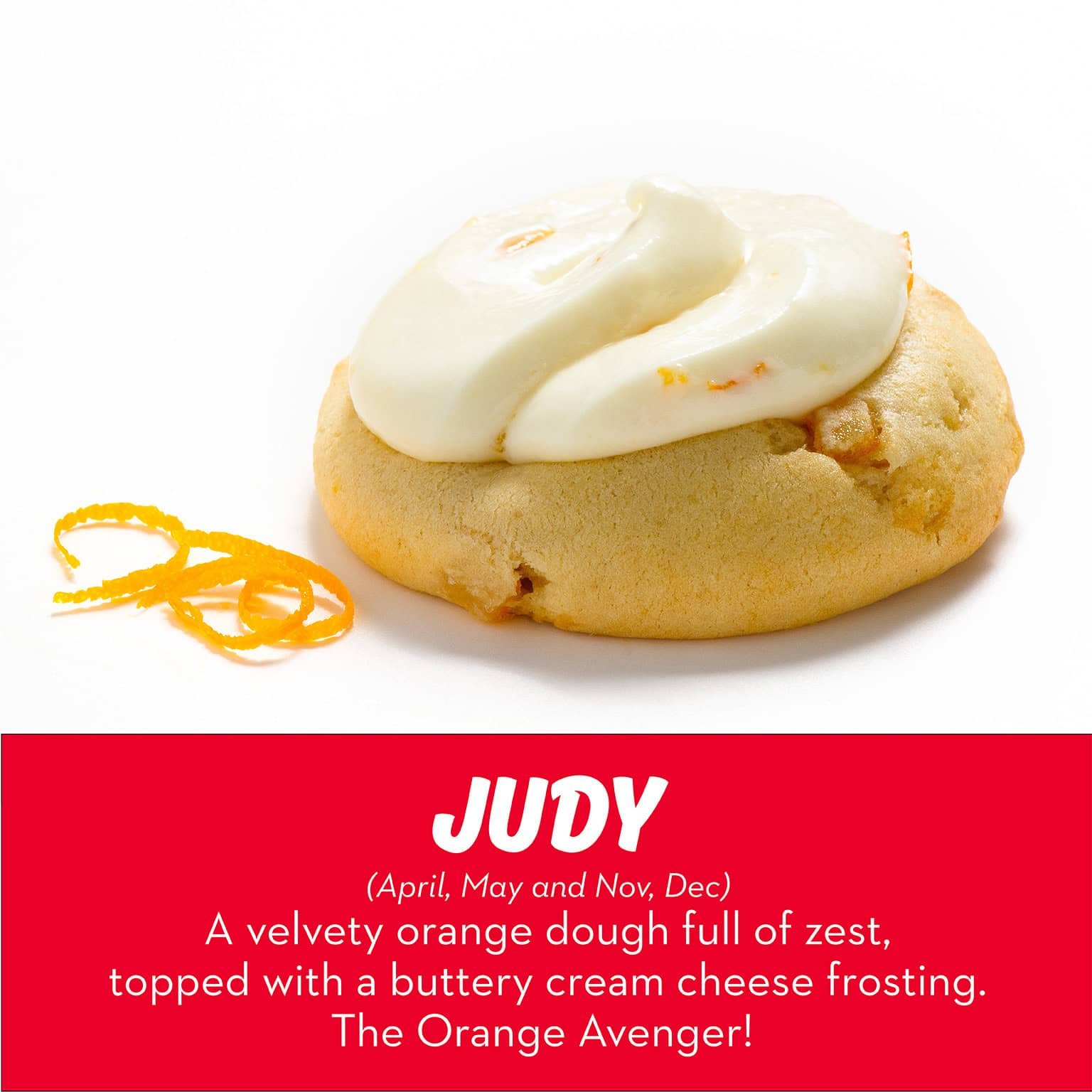 A velvety orange dough full of zest, topped with a buttery cream cheese frosting by RubySnap Bakery